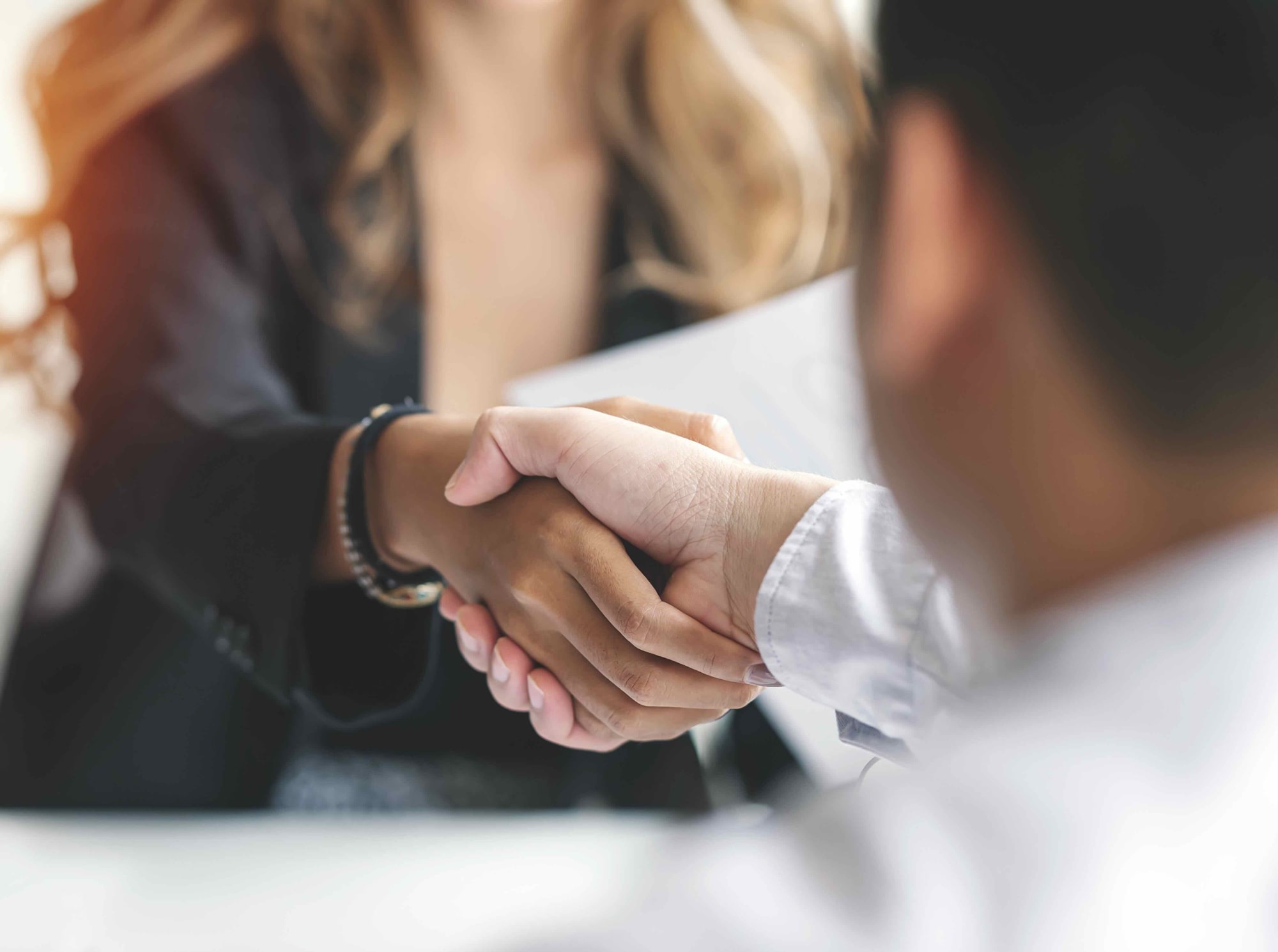 two person shaking hands