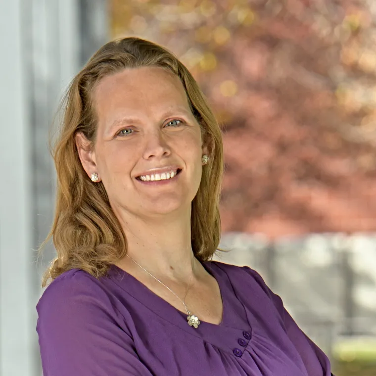 A headshot of Kacey Ernst.