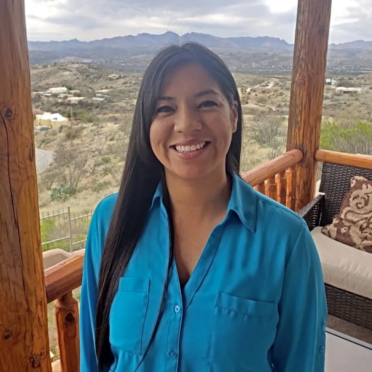 A headshot of Denisse Ortega Lorona.