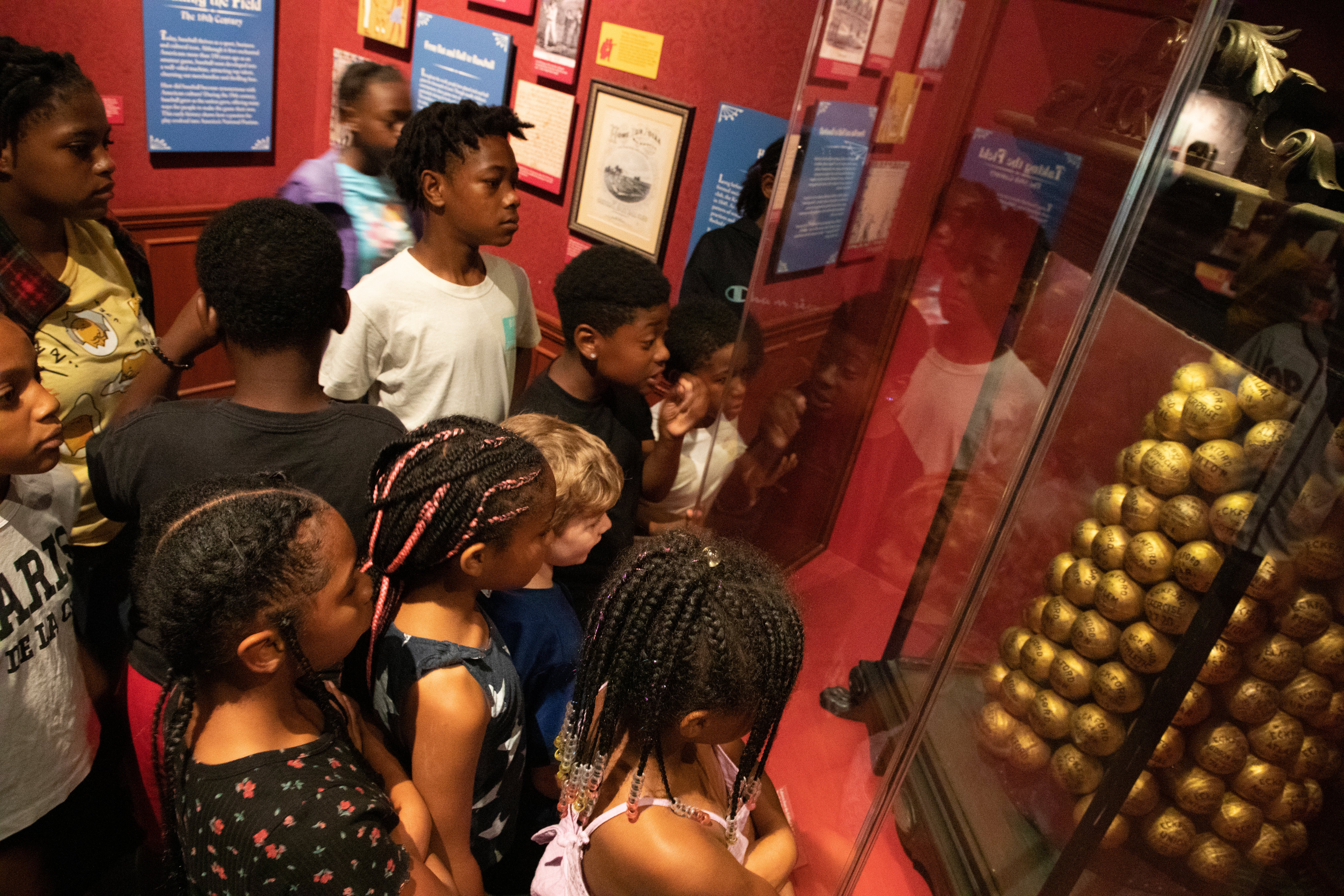 Students in the Taking the Field exhibit