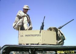 Arly Bosch sits on a tank