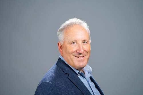 A headshot of CEE Professor Allen Goldstein against a charcoal grey background (Photo Credit: Adam Lau/Berkeley Engineering).