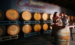 Two friends enjoying glass of wine at Chamard Vineyards