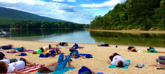 Beach yoga by the lake