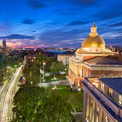 Twilight photo of a government capitol building and skyline