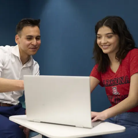 Woman and man at computer