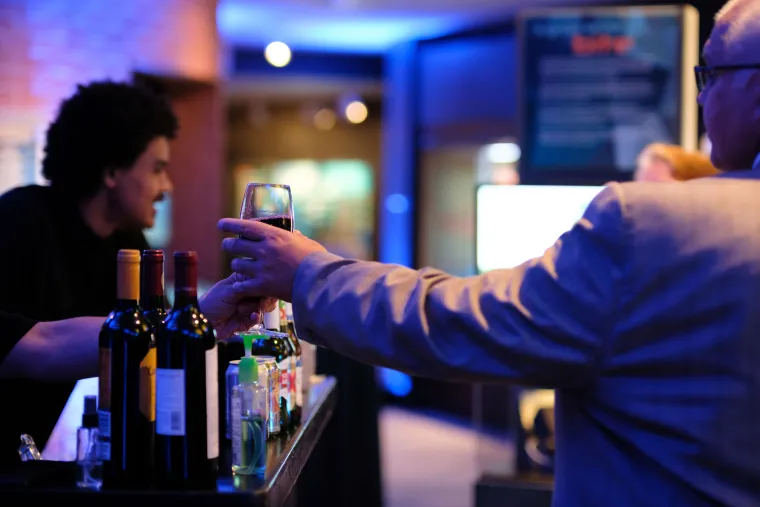 bartender at flandrau science center serves drink