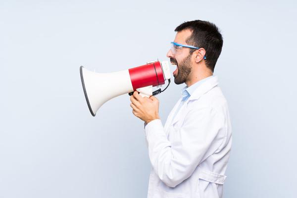 scientist speaking into a megaphone