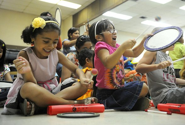 Children playing music in Family Place Library