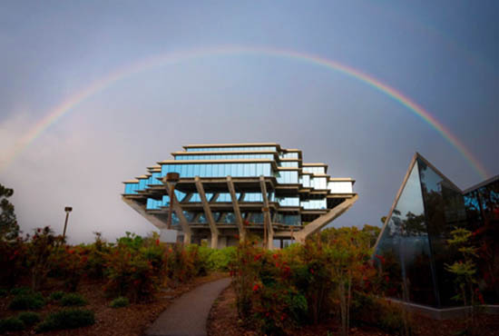 Exterior entrance of the LGBT Resource Center with rainbow flag flying near the door