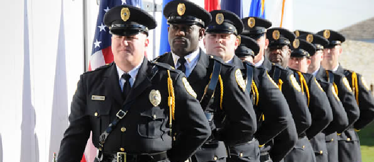 Corrections officers doing honor guard work.