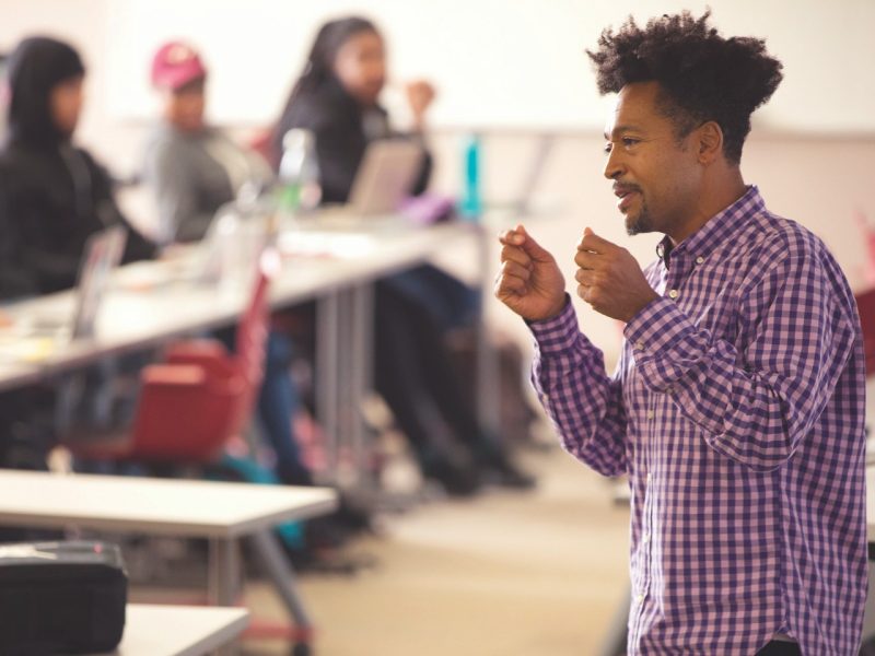 Professor teaching in front of class