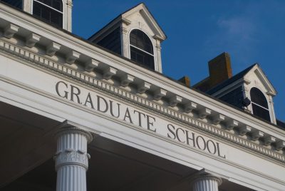 The Graduate School portico at the Blacksburg campus, with three dormer windows over the portico, which says "Graduate School"