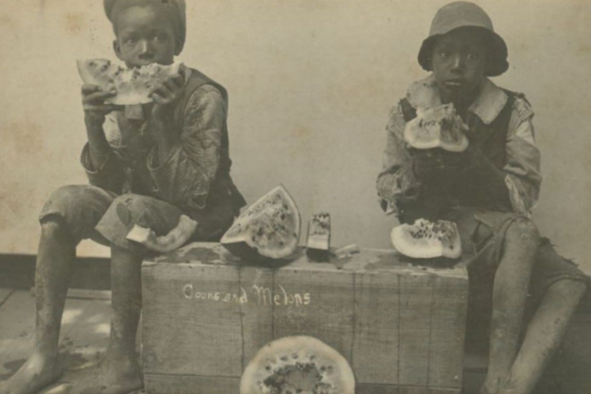 Stereotypes - two young boys eating watermelon