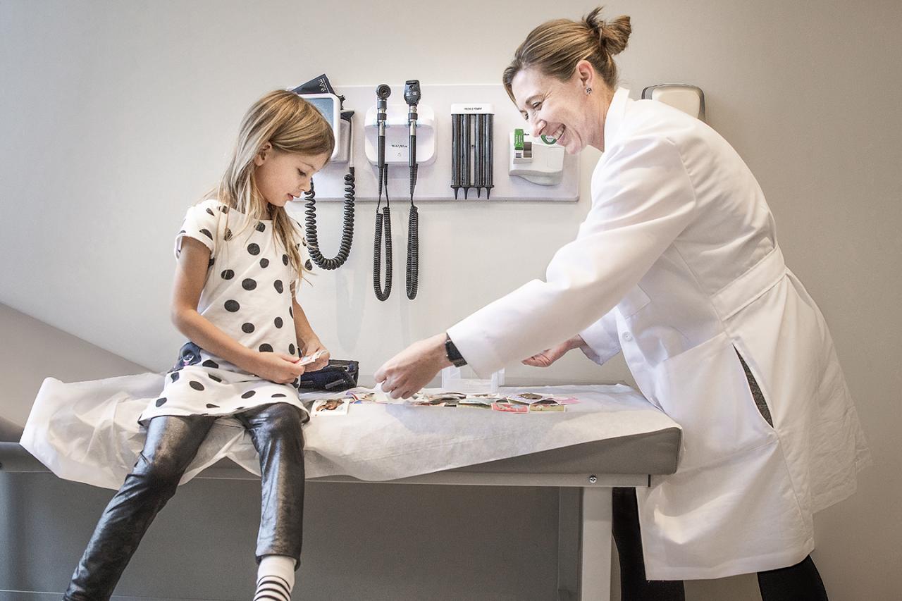 Dr. Cordelia W. Carter With Young Patient