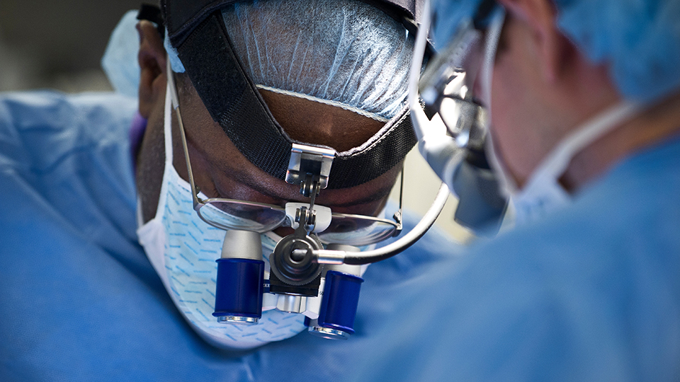 Spine Surgeon Dr. Anthony Frempong-Boadu Performing Surgery