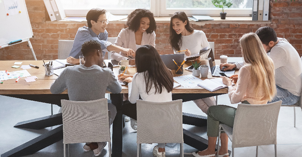 Group of individuals at a meeting table