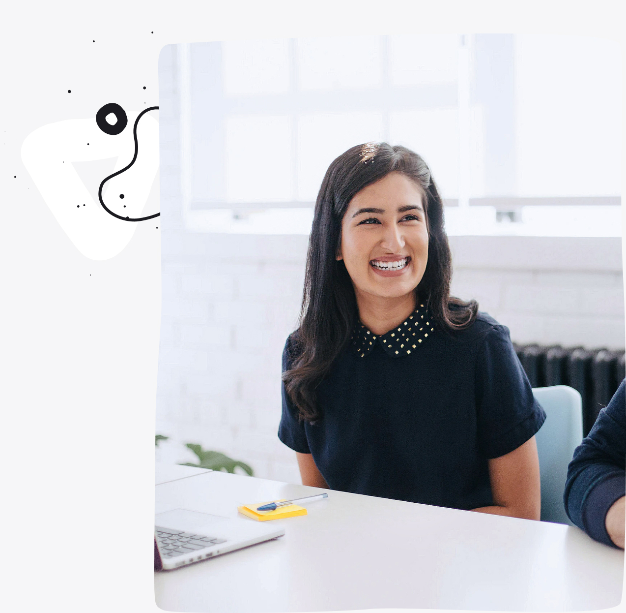 Picture of a smiling woman in an office