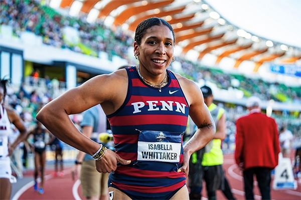 Isabella Whittaker stands with her hands on her hips at the NCAA Championships.