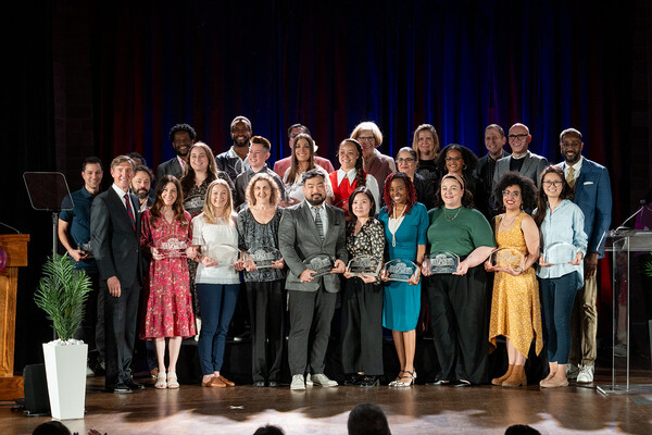 Let's Talk team on stage with Penn Interim President