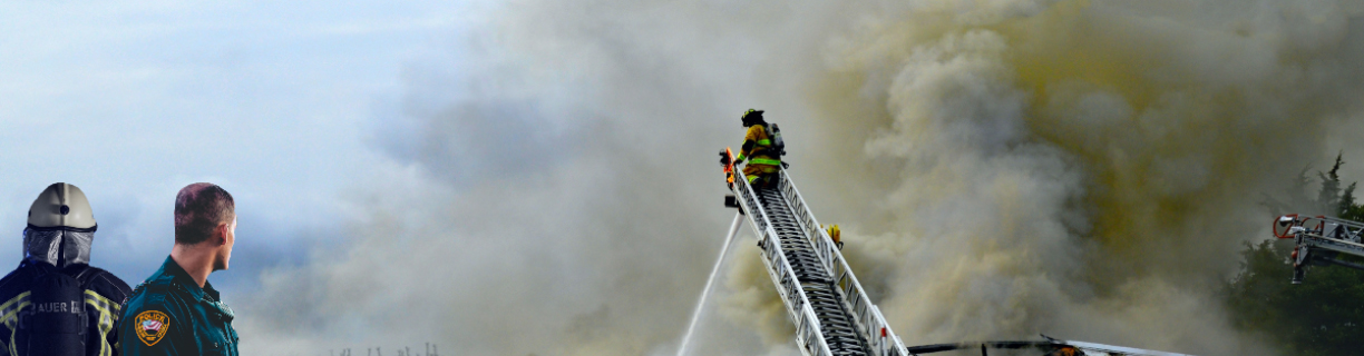 First responders looking towards a firefighter at work