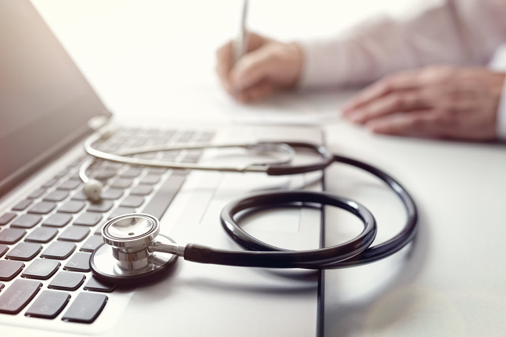 laptop with stethoscope