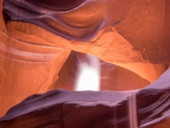 a waterfall inside a cave