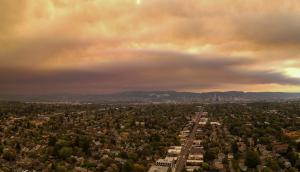 Labor Day 2020 brought hot, dry, easterly winds across the west coast, fanning record-breaking megafires that threatened suburbs and compromised air quality in cities like Portland Oregon, shown here. Photo by Ted Timmons.