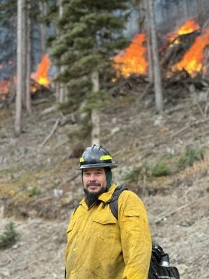 fuels planner on the carson national forest burns piles in 2023