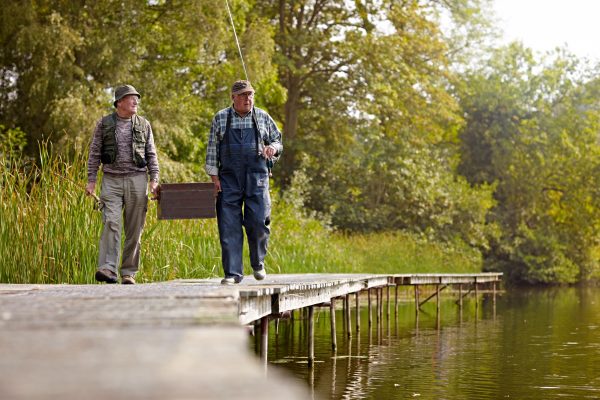 Senior men fishing at the lake