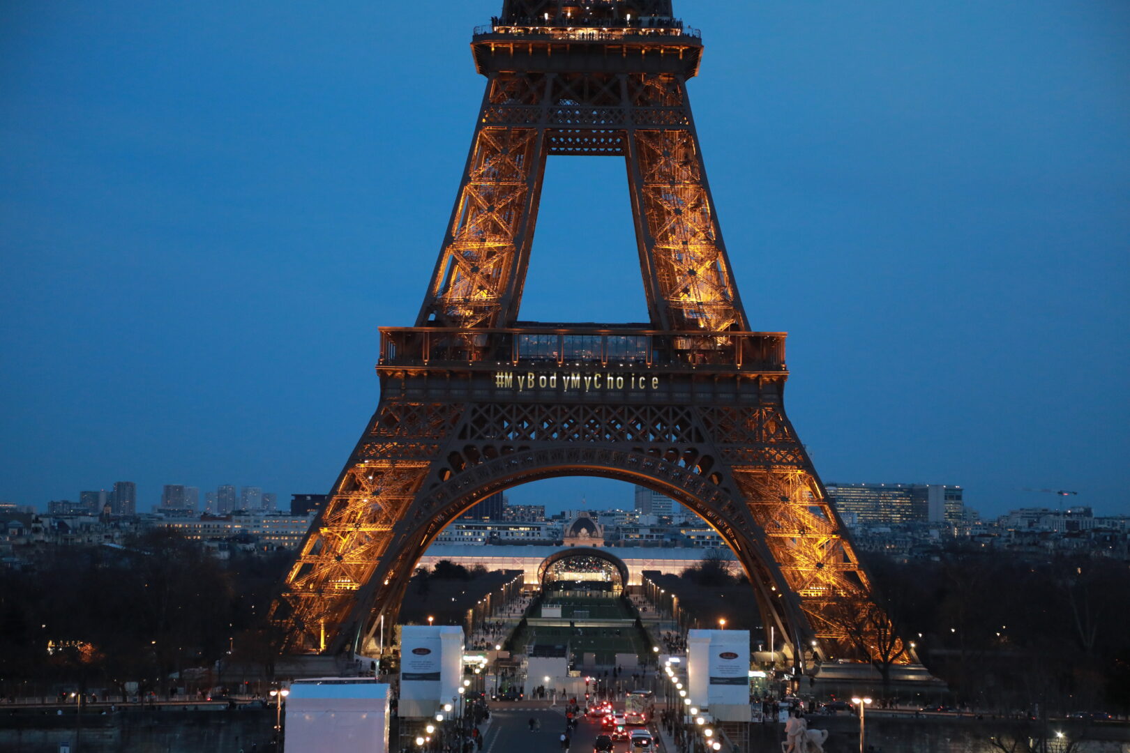 The words 'My body my choice' are projected onto the Eiffel Tower in Paris as demonstrators demanding the inclusion of the right to abortion in the constitution gathered for a women's rights rally in front of a giant screen nearby to follow the debate on the single-article draft law on March 4.