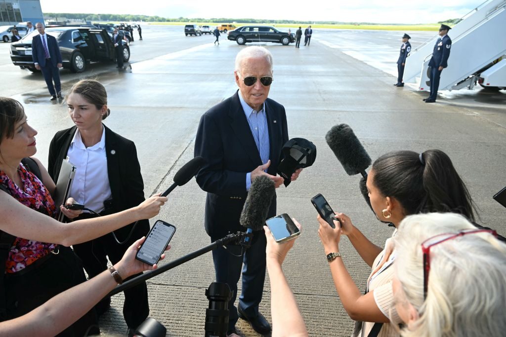 President Joe Biden speaks to the press before boarding Air Force One in Madison, Wis., following a campaign rally and television interview.