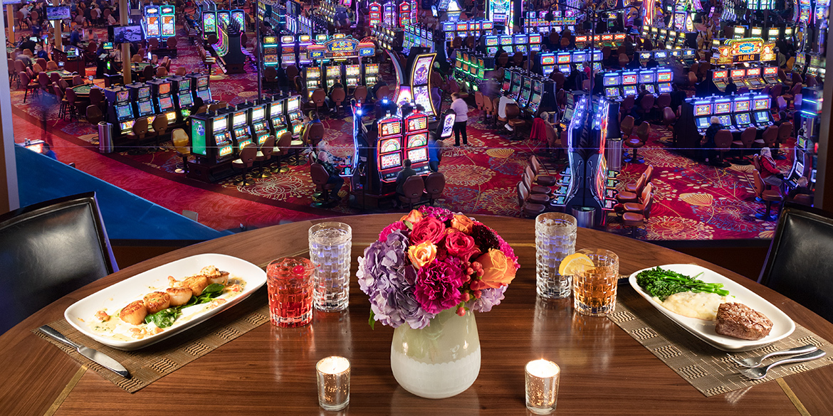 Table at Western Door Steakhouse with view of the casino floor