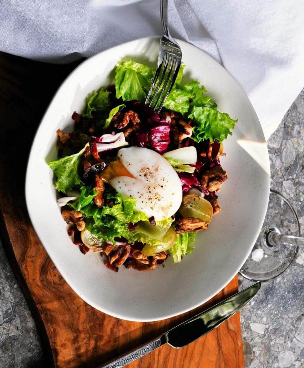 Sous Vide Poached Egg Salad with Warm Bacon Dressing