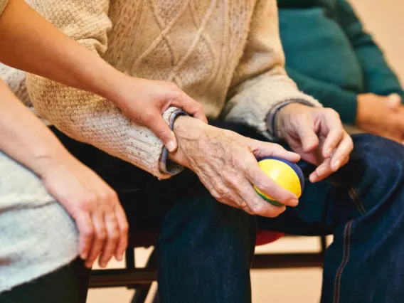 Person Holding a Stress Ball