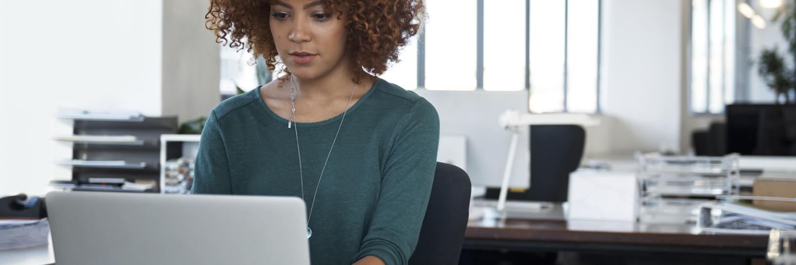 Woman using a computer.