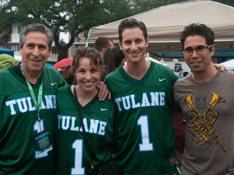 A family poses for a photo at homecoming