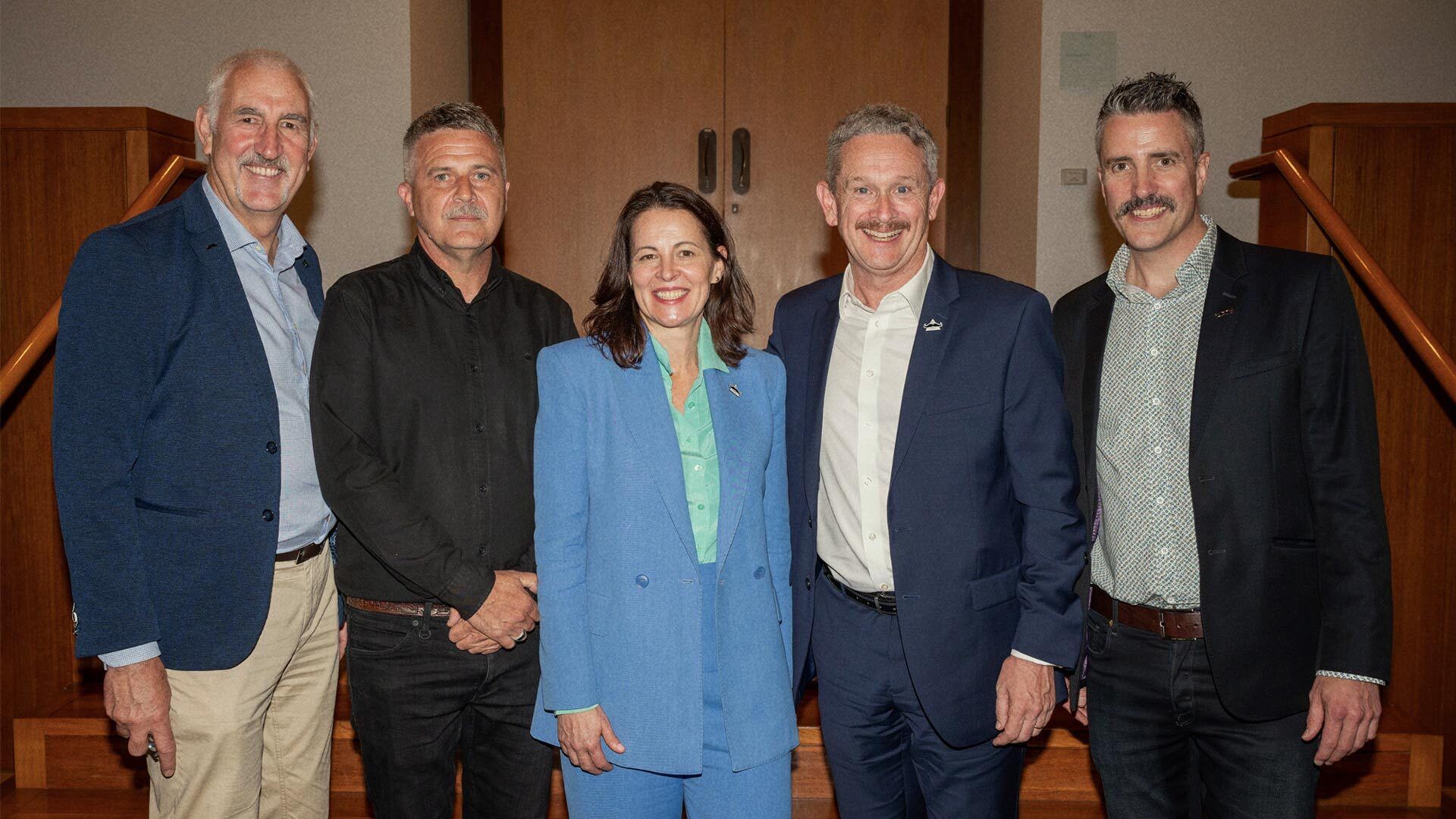 Photo showing Movember personnel: Paul Villanti, Trav Garone, Michelle Terry, Richard Deutsch and Simon Rice.