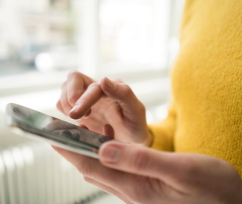 Woman avoiding a scam call.