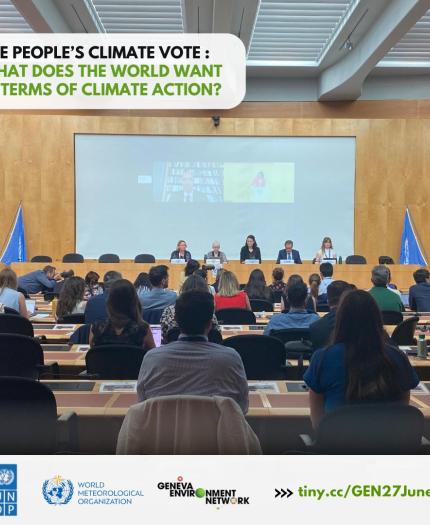 A climate action panel discussion takes place with five speakers on stage and an audience seated in front. The event is part of "The People's Climate Vote" by various environmental organizations.