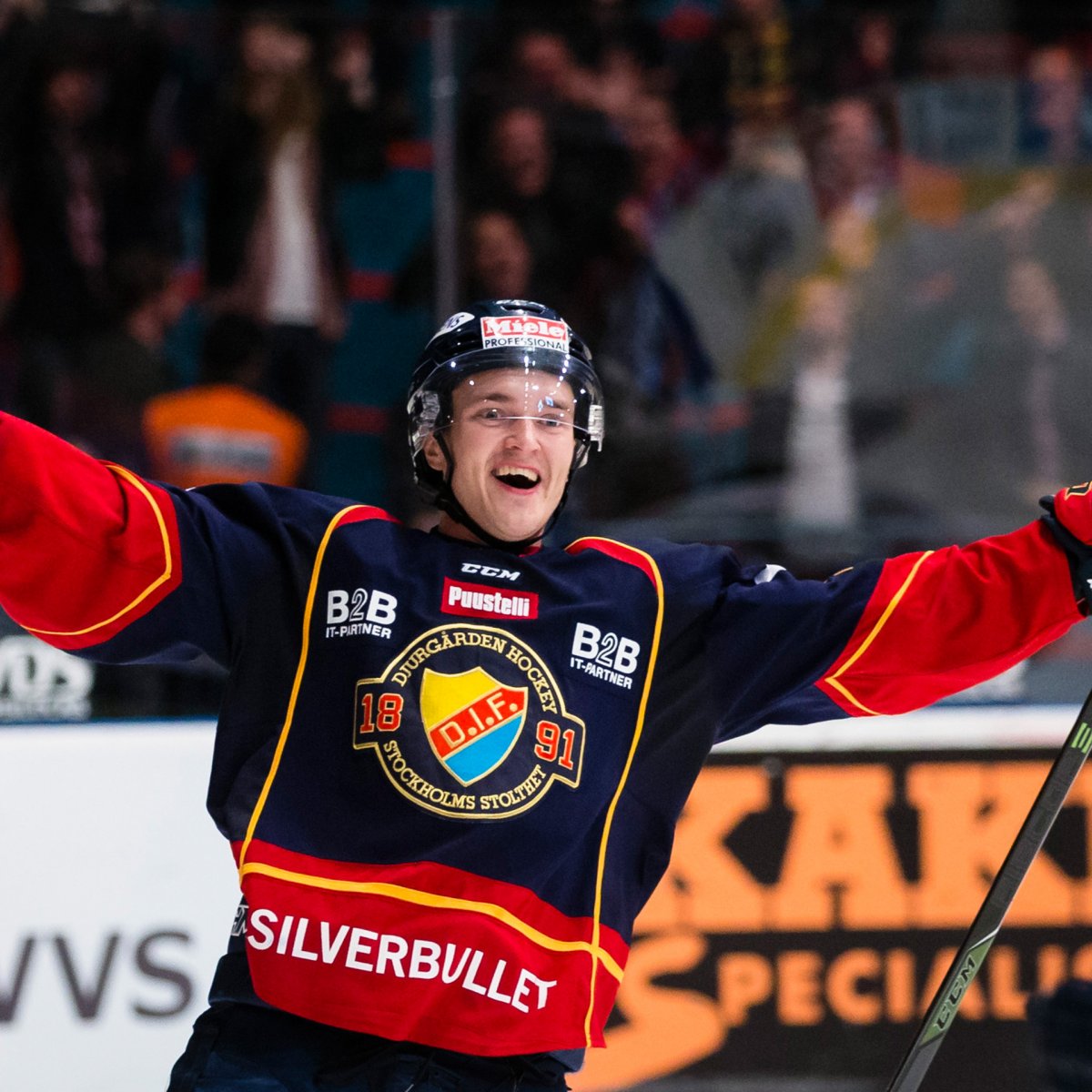 Djurgarden hockey player celebrating on the ice