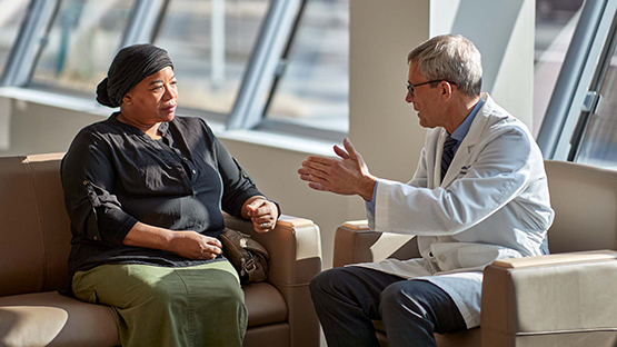 Doctor meeting with a patient in a waiting room