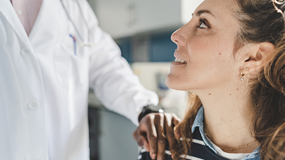 A patient talking to her health care professional.