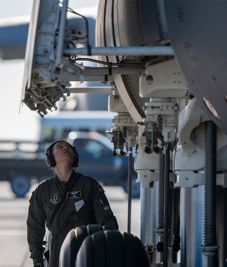 airmen working on aircraft