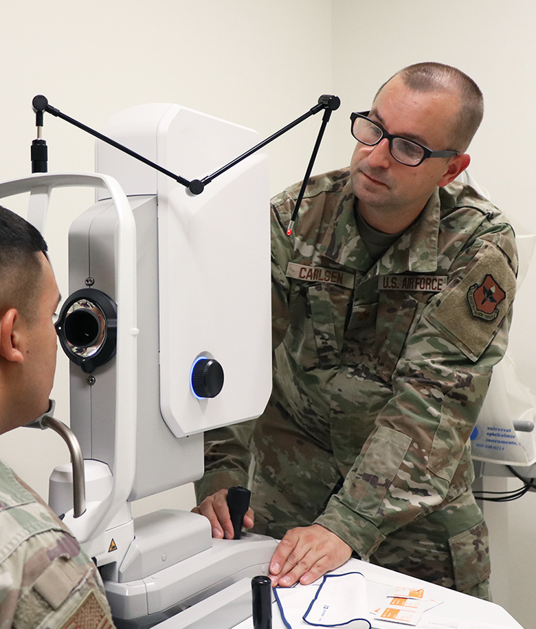 optometrist examining a patient