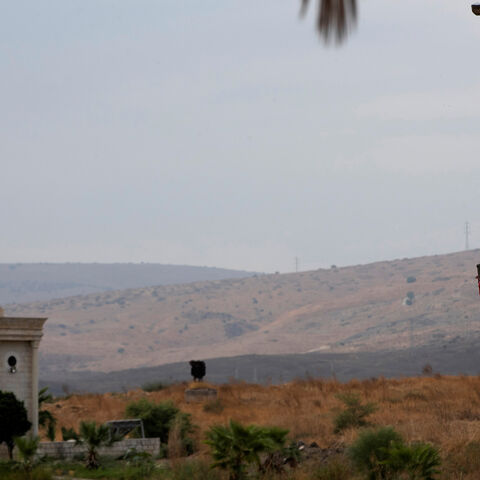 The national flags of Jordan and Israel are seen from the Israeli side of the border area between Israel and Jordan, in Naharayim October 29, 2019. Picture taken October 29, 2019. REUTERS/Ronen Zvulun - RC2C8D9T9AHO