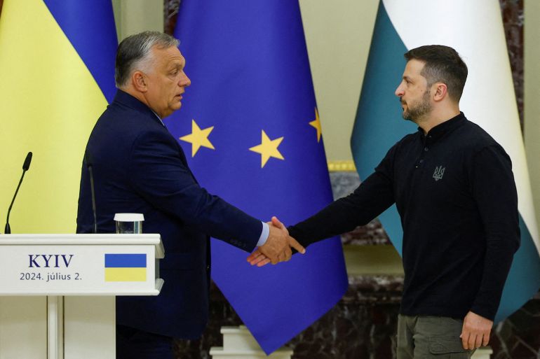 Hungary's Prime Minister Viktor Orban and Ukrainian President Volodymyr Zelenskiy shake hands after a joint news briefing, amid Russia's attack on Ukraine, in Kyiv, Ukraine July 2, 2024.