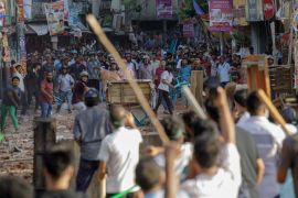 Anti-quota protesters and members of the Bangladesh Chhatra League, the student wing of the governing Awami League party, clash in the capital, Dhaka. [KM Asad/LightRocket via Getty Images]