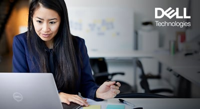 woman doing work on a Dell laptop