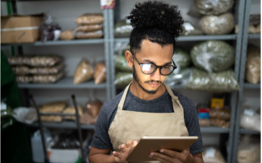 man checking inventory